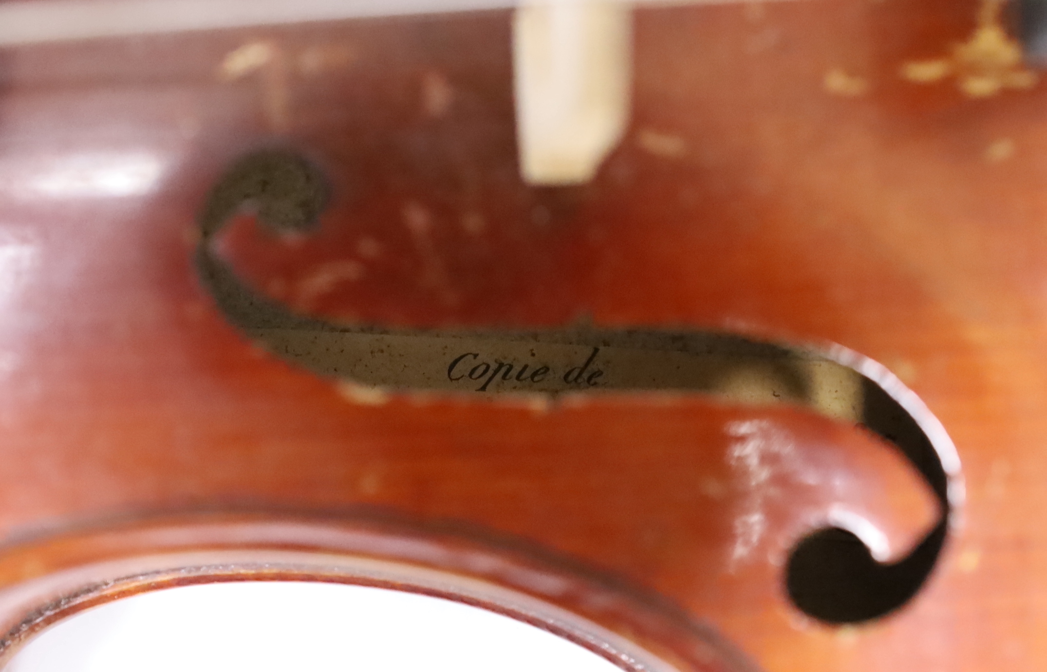 A cased 3/4 sized student violin marked Dresden, with reproduction Stradivarius label